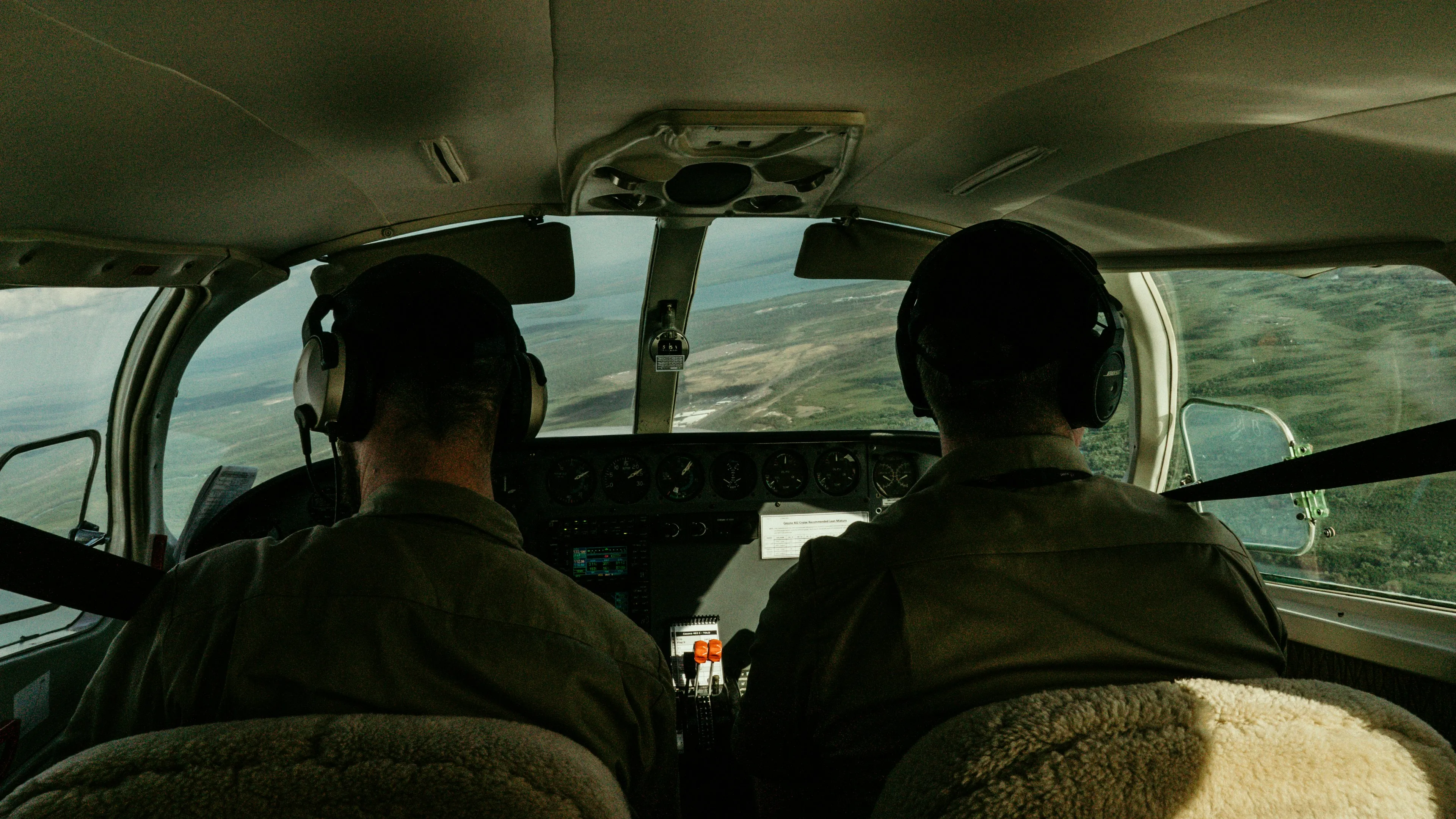 Student pilot reviewing preflight checklist with instructor