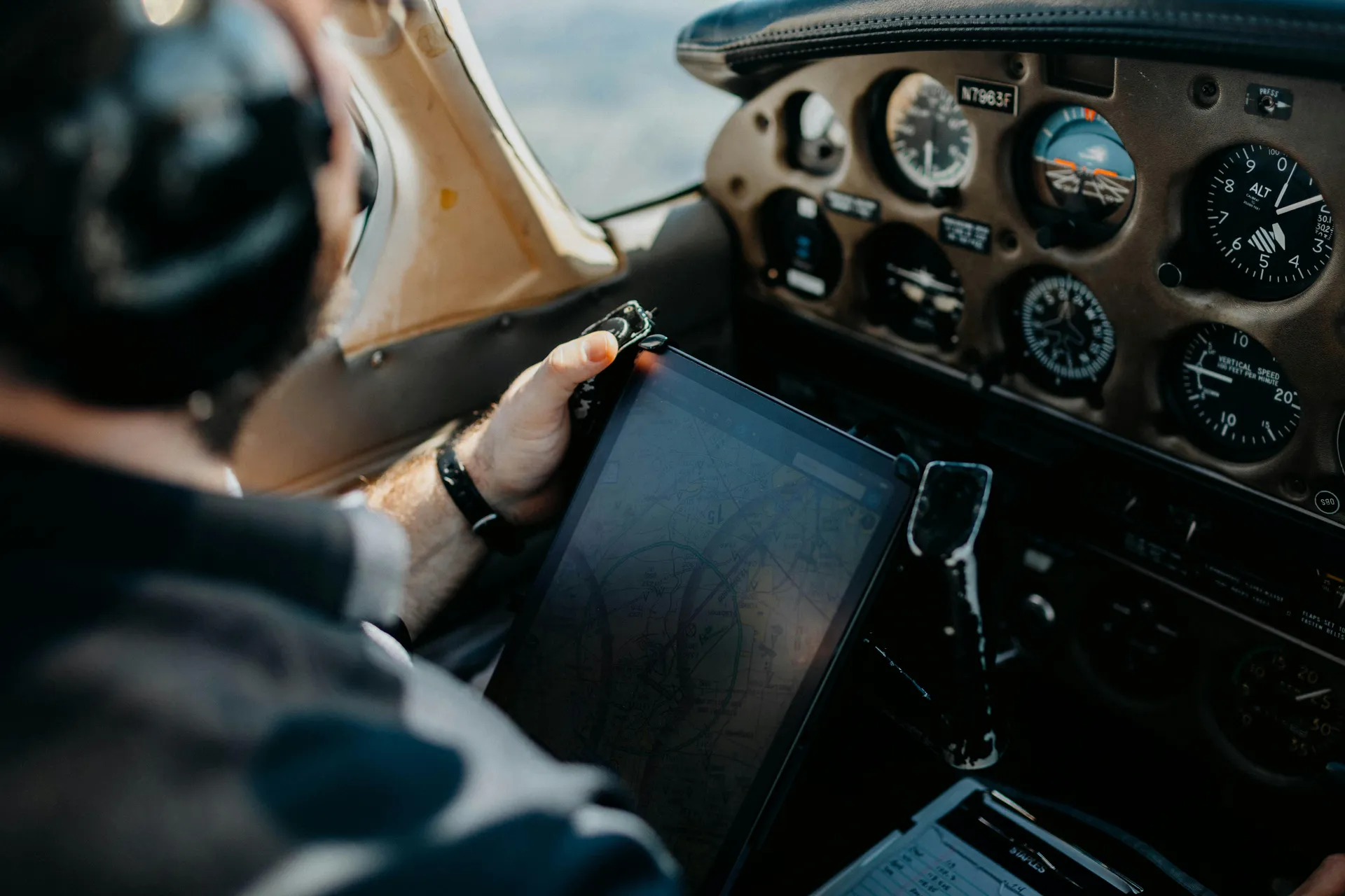 Instrument student pilot flying under the hood with instructor